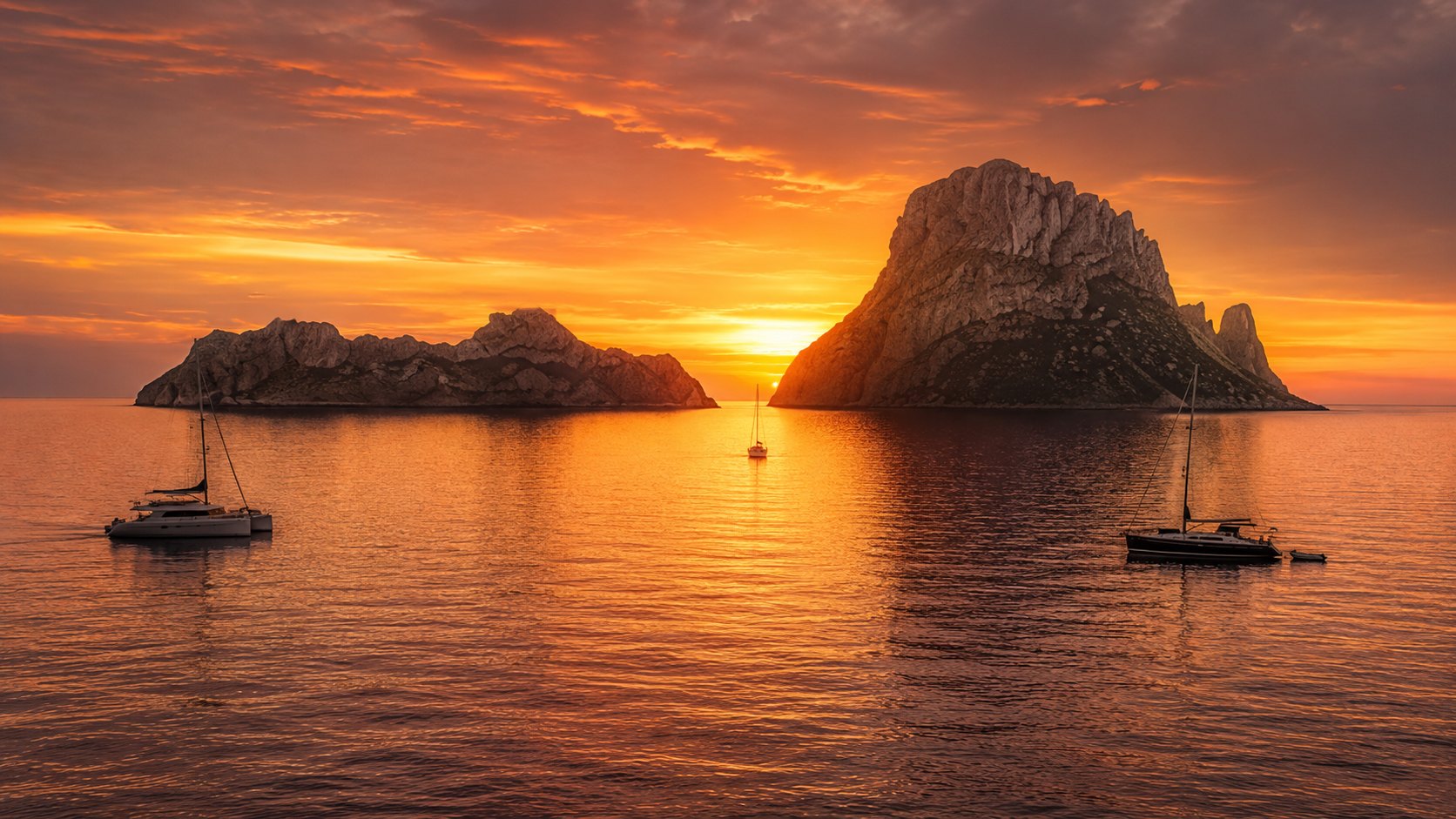 Sunset over Es Vedrà seen from the Vytal yacht